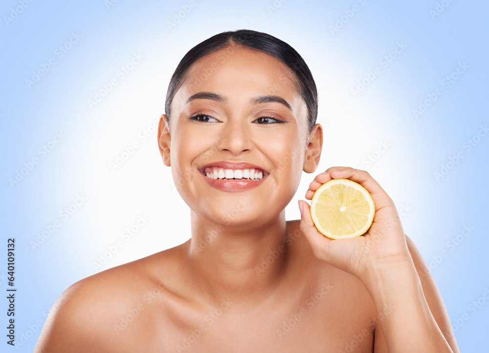 Beauty, lemon and happy studio woman with citrus fruit for organic skincare glow, facial detox or na