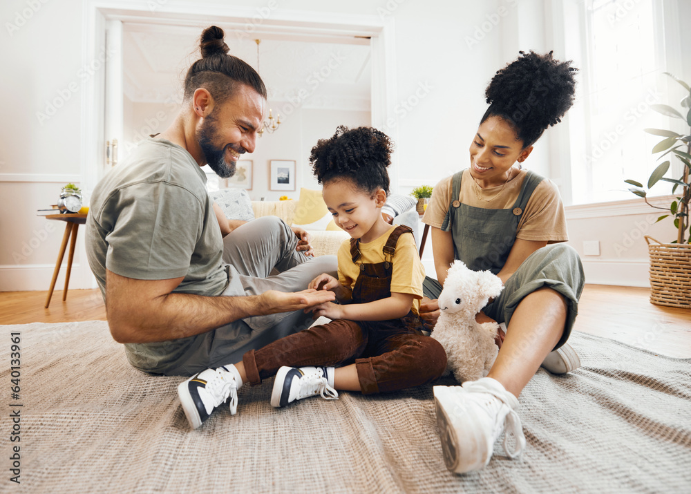 Happy family, bond and relax on a floor with care, fun and hand game in a home. Love, carpet and boy