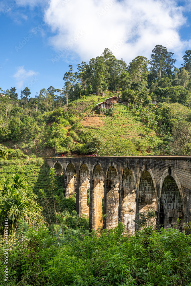 Famous Nine Arch Bridge on a sunny day in Ella, train journey Sri Lanka