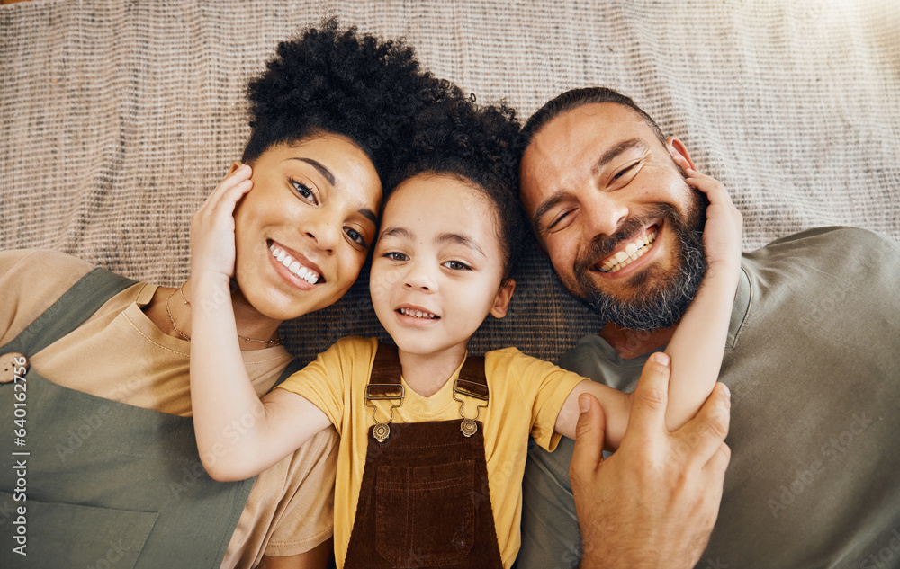 Portrait, family and a boy with his parents on the floor of the living room in their home together f