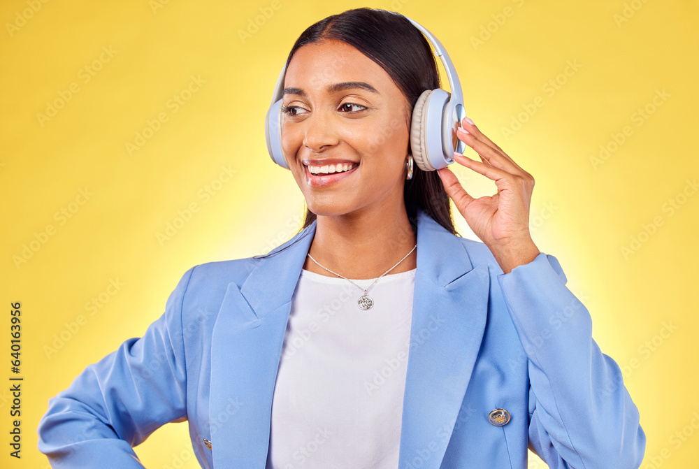 Headphones, smile or businesswoman streaming music or thinking of podcast on yellow background. Happ