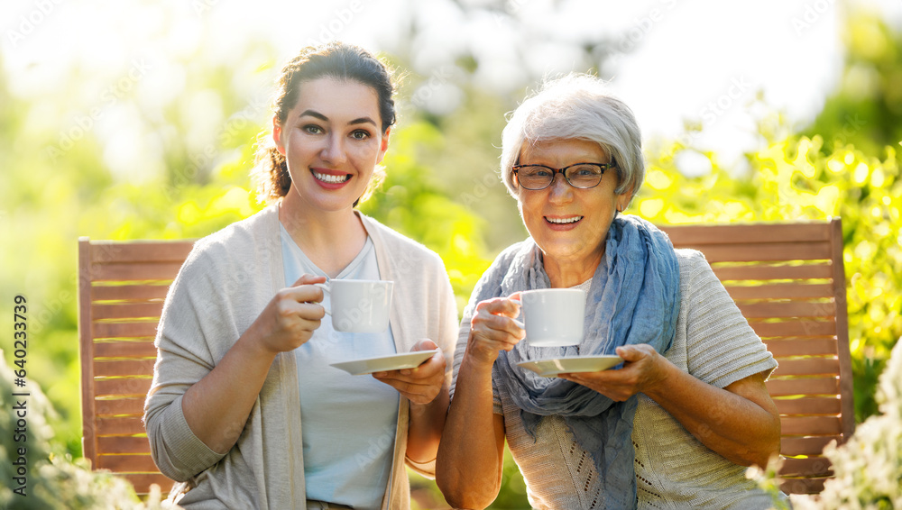 women drinking tea in the garden