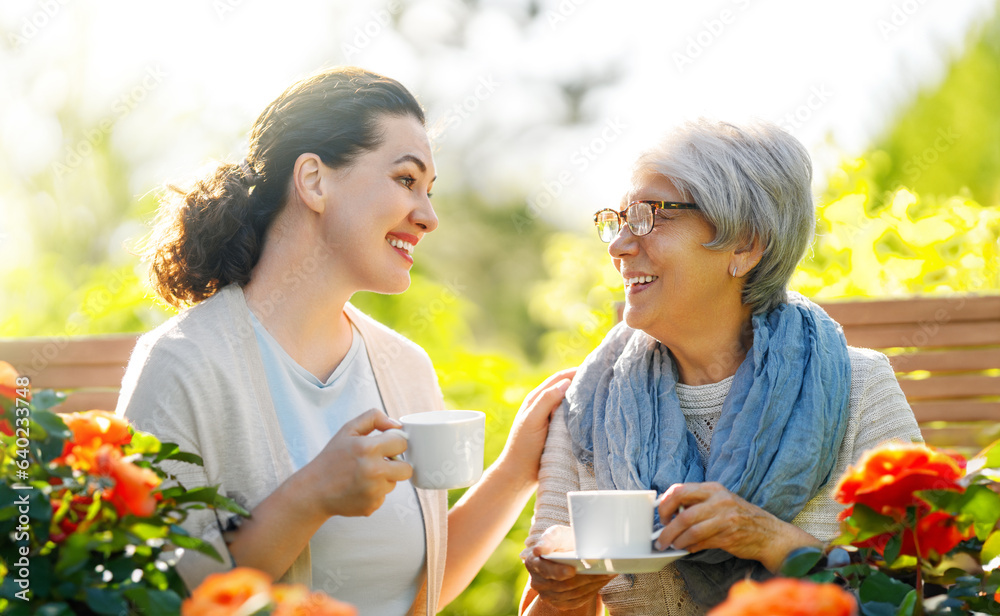 women drinking tea in the garden