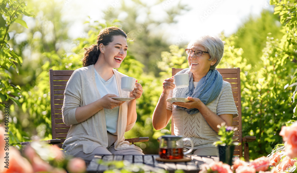 women drinking tea in the garden