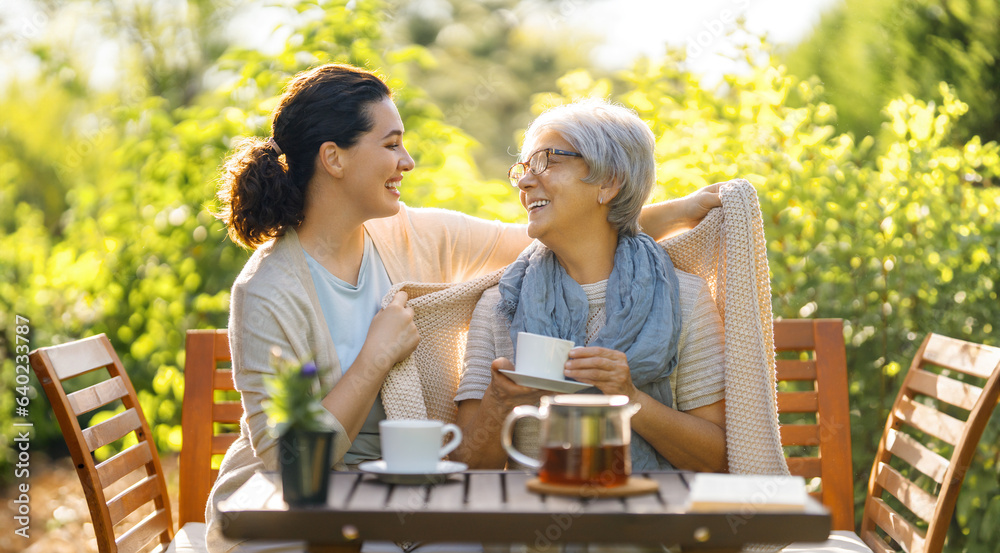 women drinking tea in the garden