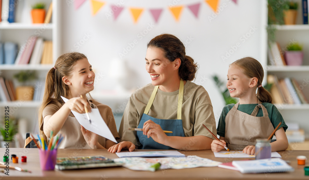 kids and teacher at the art class