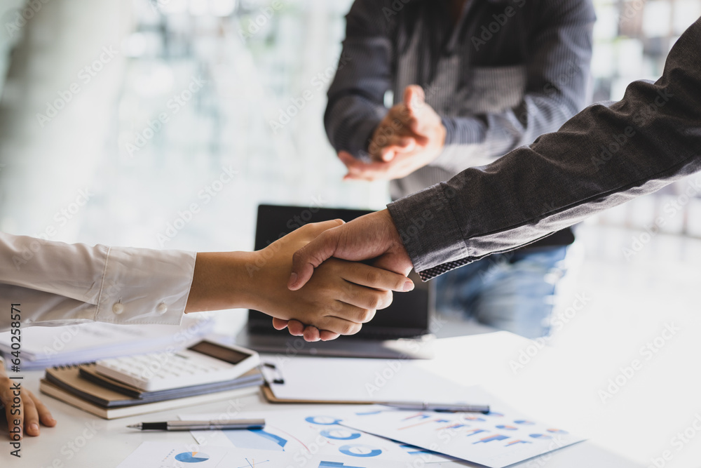 Business meeting, businessman shaking hands in business partnership meeting, business cooperation.