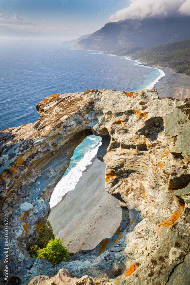 Cliff hole above beach of Nonza, Corse, France