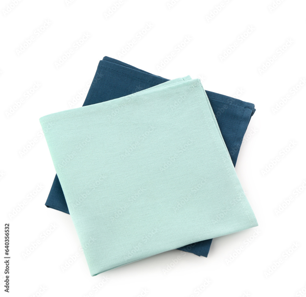 Folded napkins on white background