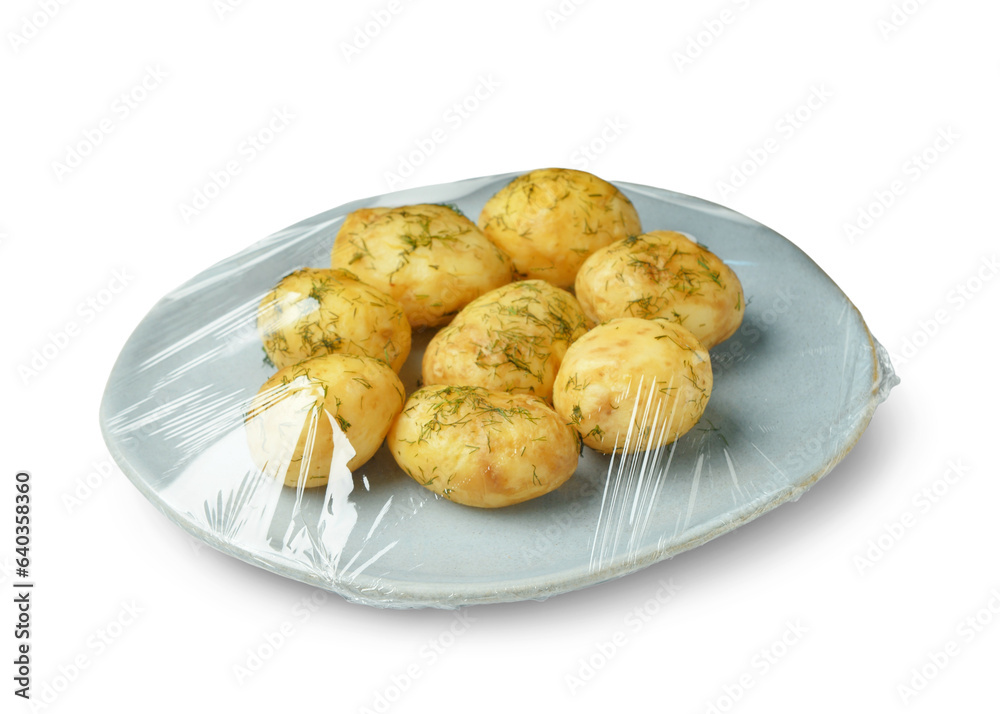 Plate of tasty boiled potatoes wrapped with stretch wrap on white background