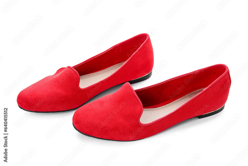 Stylish red ballet flats on white background