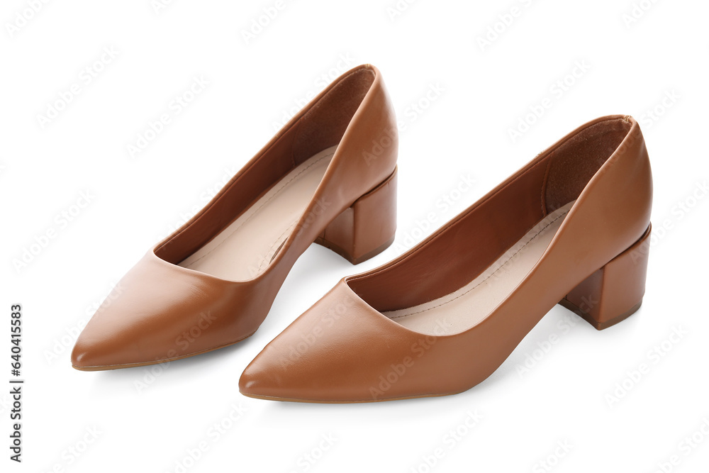 Stylish brown high heels on white background