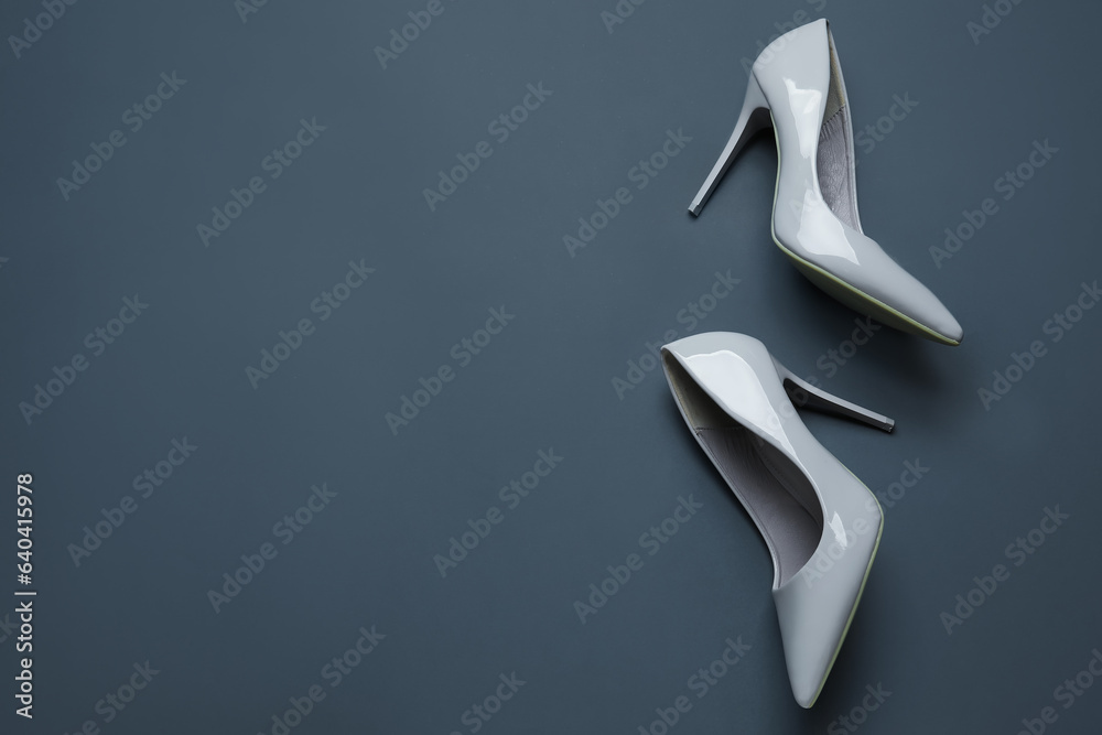 Stylish high heels on grey background