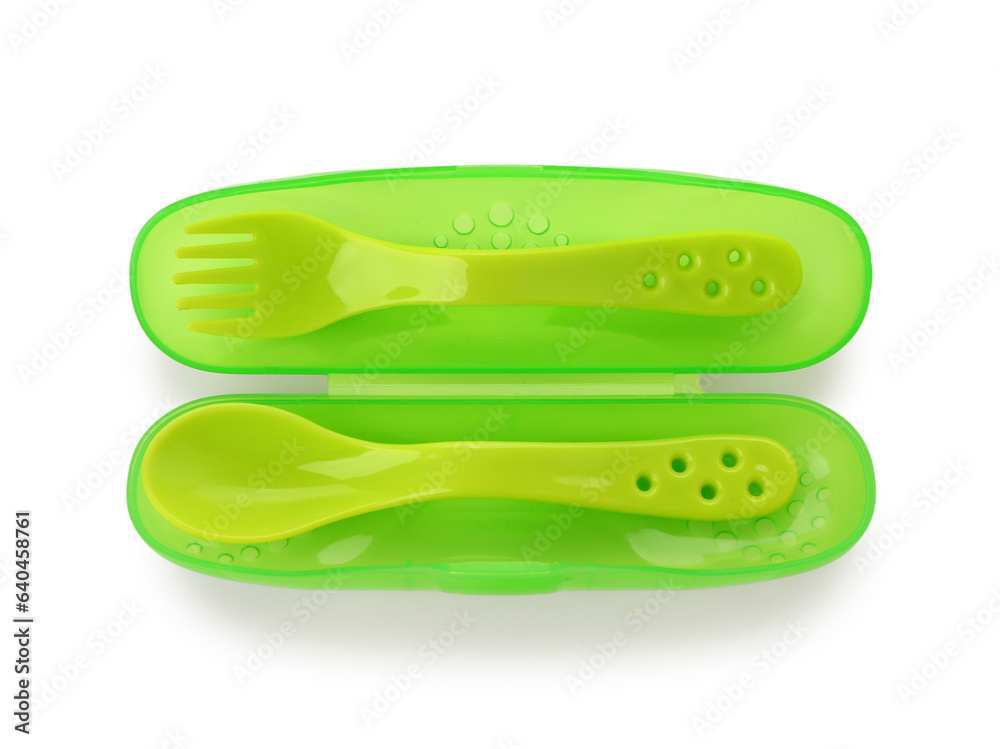 Container with cutlery for baby on white background