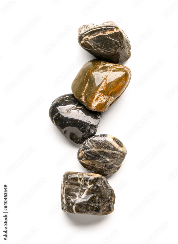 Many pebble stones on white background