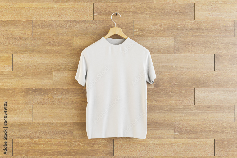 Empty white t-shirt hanging on wooden wall background. Ad, textile and fashion concept. 3D Rendering