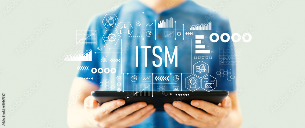 ITSM - Information Technology Service Management theme with young man using a tablet computer