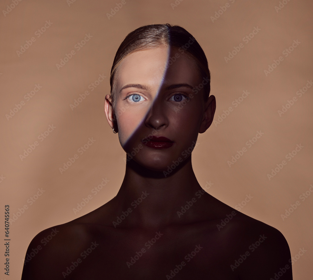 Spotlight, portrait or woman in shadow with beauty and creative aesthetic in studio background. Ligh