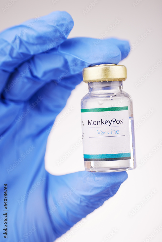 Health, doctor and vaccine in hand, bottle with closeup and safety from monkey pox on white backgrou