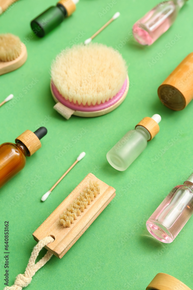 Composition with cosmetic products and bath supplies on color background