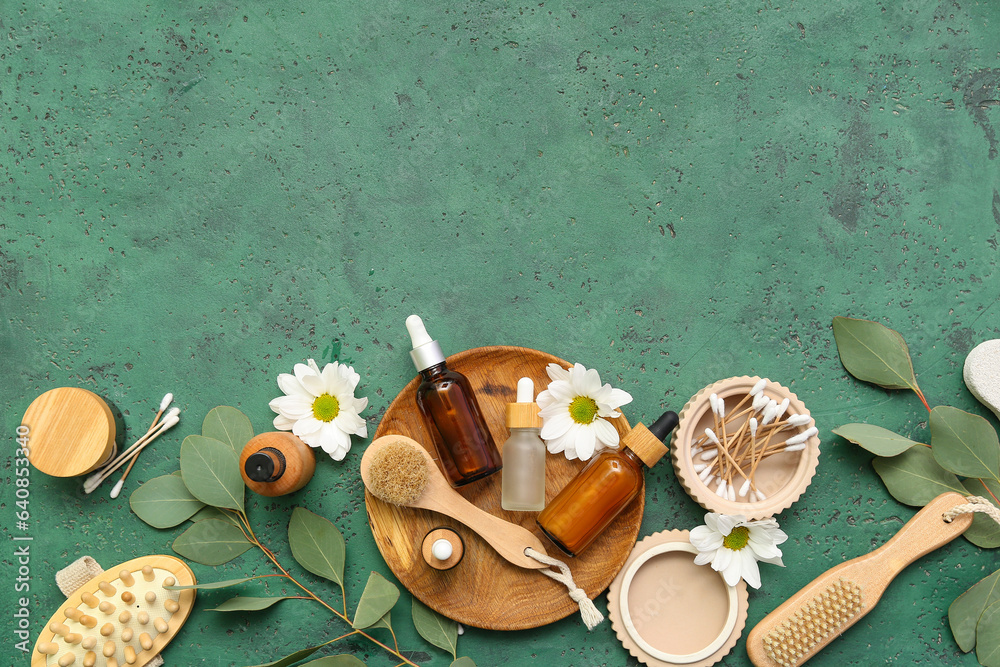 Composition with cosmetic products, bath supplies and flowers on color background