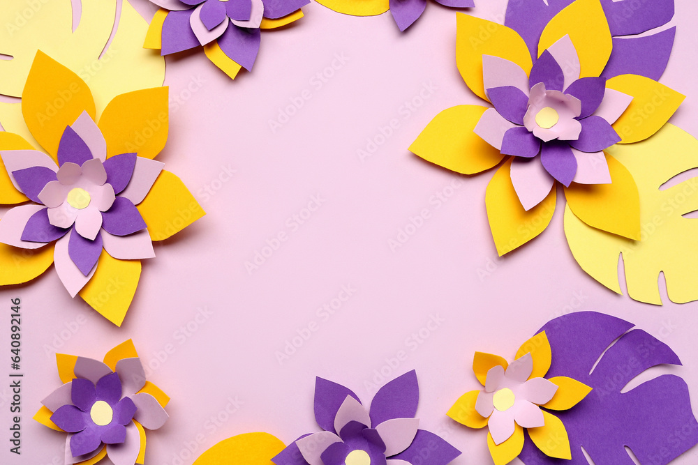 Frame made of colorful origami flowers and leaves on purple background