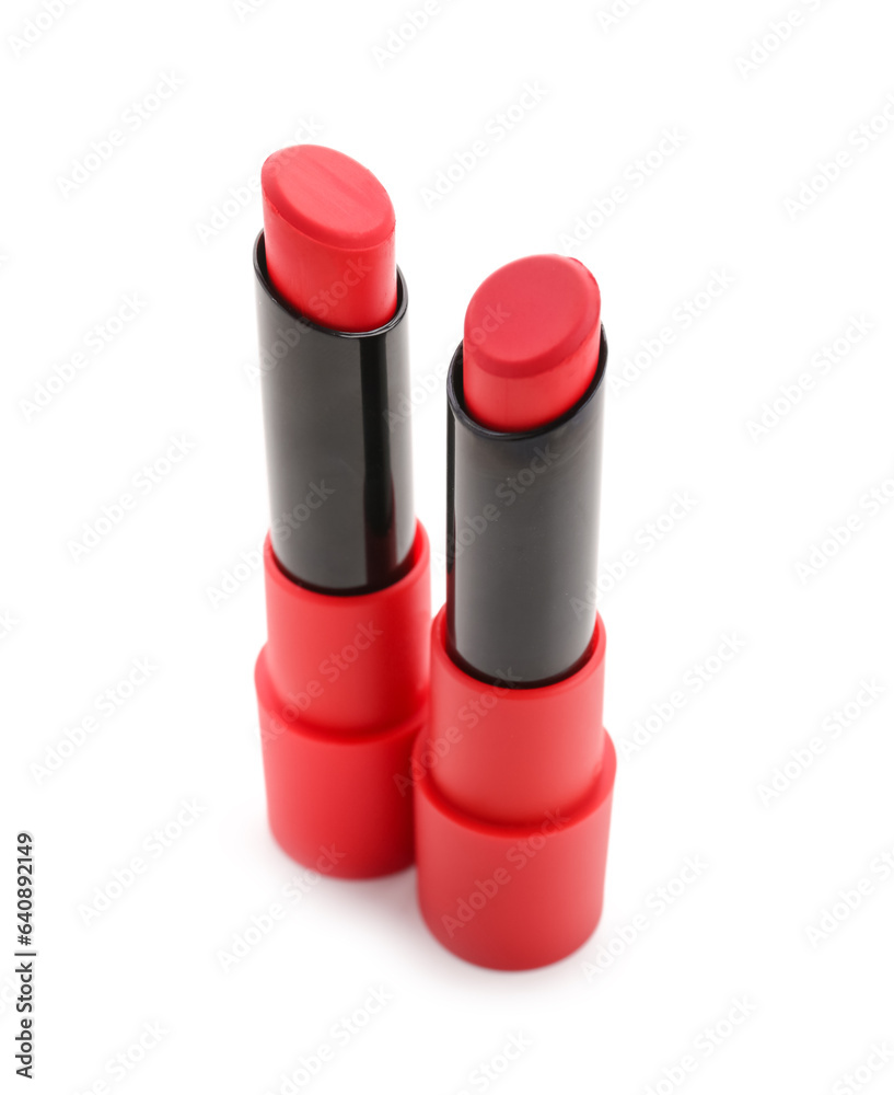 Beautiful red lipsticks on white background