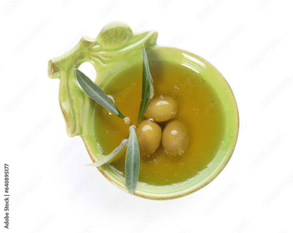 Bowl of fresh olive oil on white background