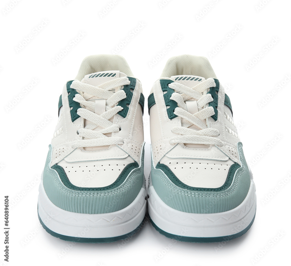 Stylish sneakers on white background