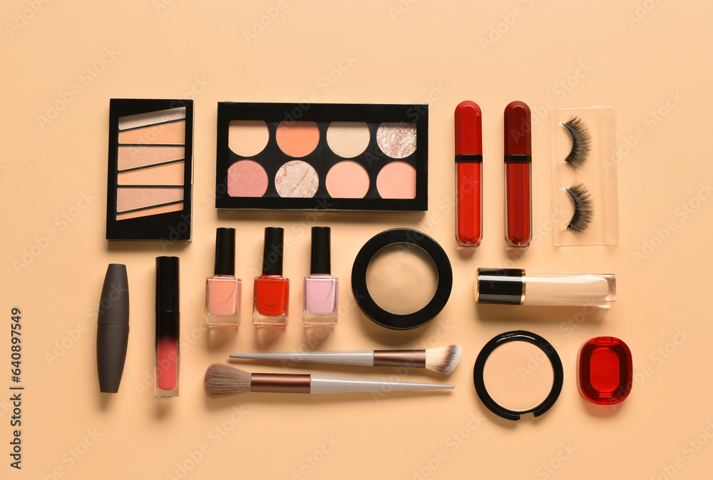 Different decorative cosmetics on yellow background