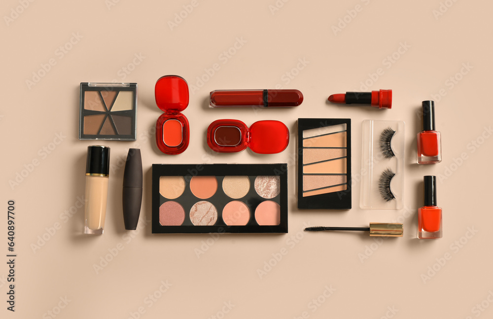 Different decorative cosmetics on beige background