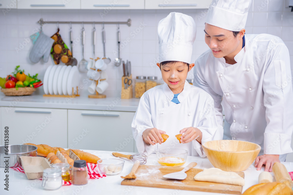 father and son cooking