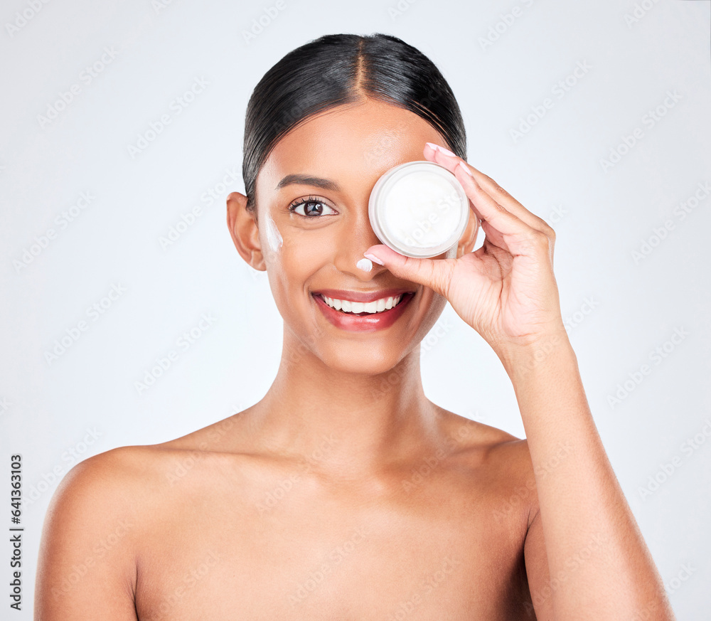 Woman, cream on face and container for beauty, moisturizer and skincare isolated on white background