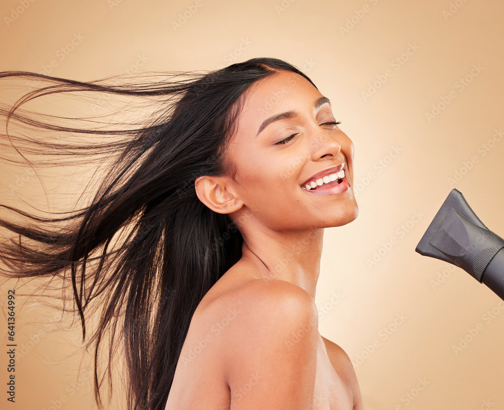 Woman, hair with dryer and wind, beauty and cosmetics tools with shine isolated on studio background