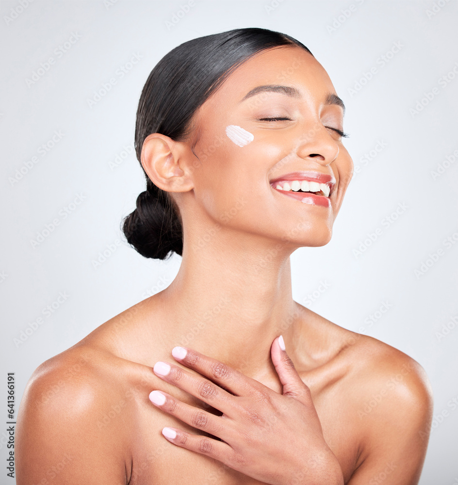 Smile, cream and woman with cosmetics, beauty and wellness on a white studio background. Person, hap