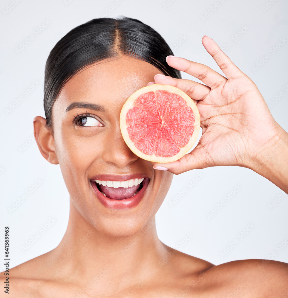 Grapefruit, happy woman and face with beauty, healthy and natural skincare with citrus fruit on whit