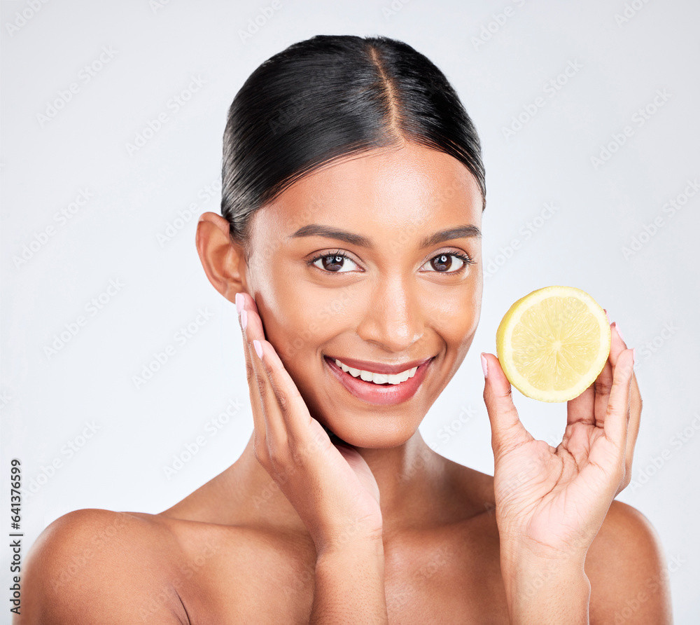 Portrait, beauty and lemon with a natural woman in studio on a white background for vitamin C nutrit