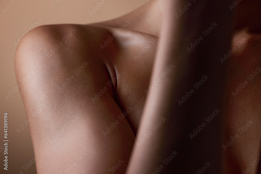 Healthy, skin and body closeup on woman, shoulder or natural glow and skincare texture in studio wit