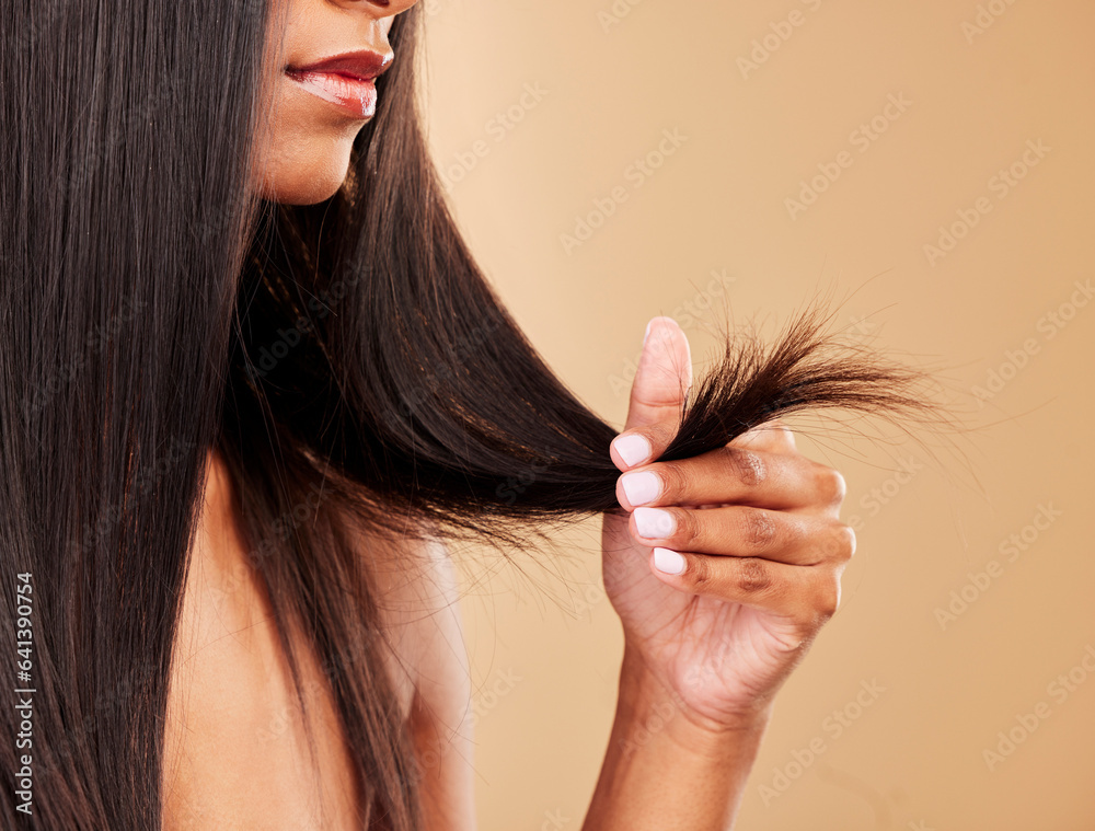 Hair, split ends and damage with woman, beauty and keratin treatment fail on studio background. Dry,