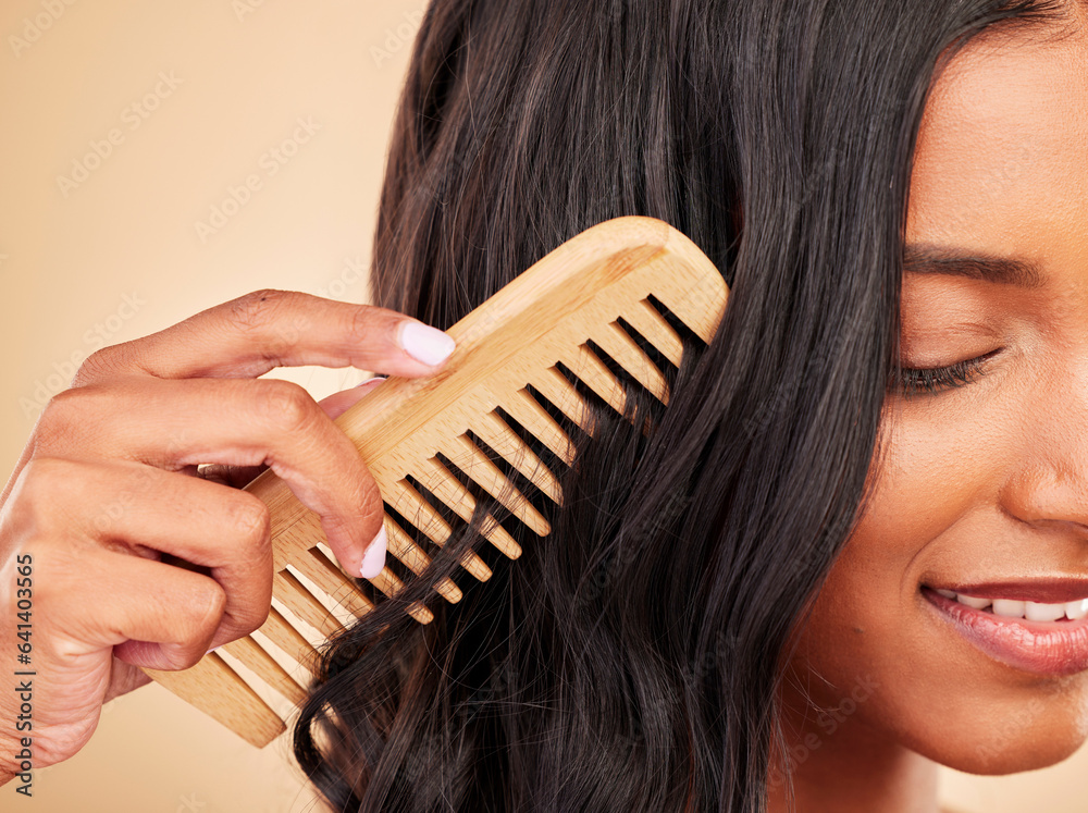 Comb, closeup and young woman in studio with clean salon treatment hairstyle for wellness. Health, h