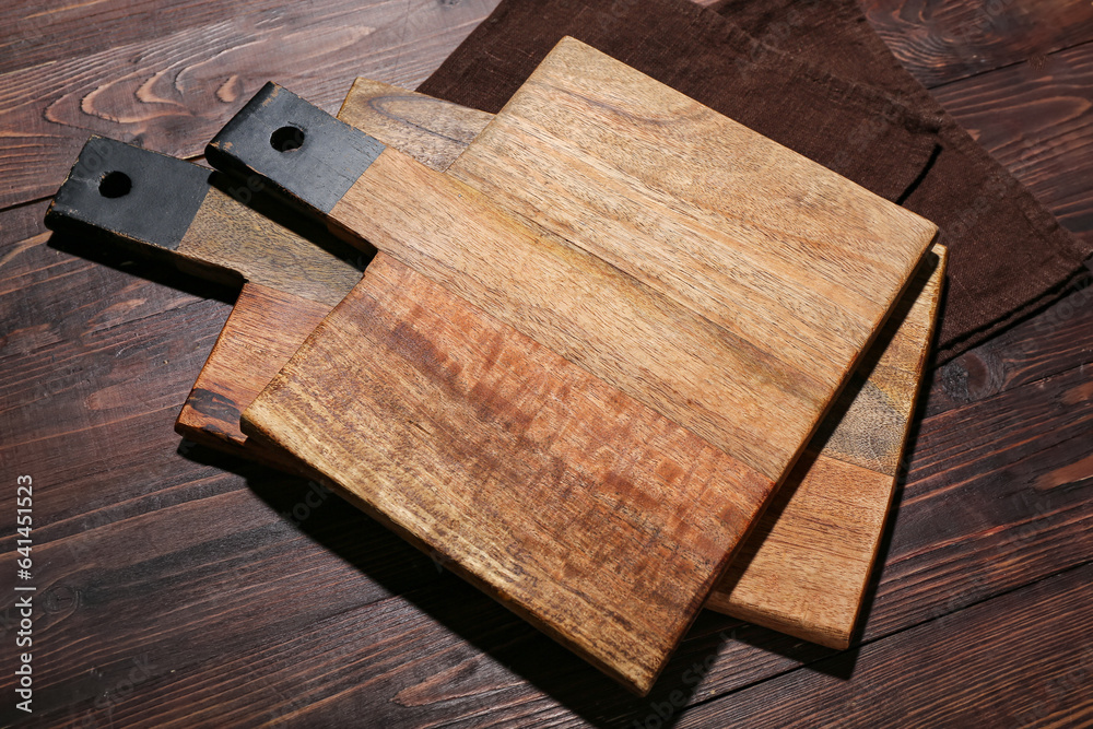 New cutting board on wooden background