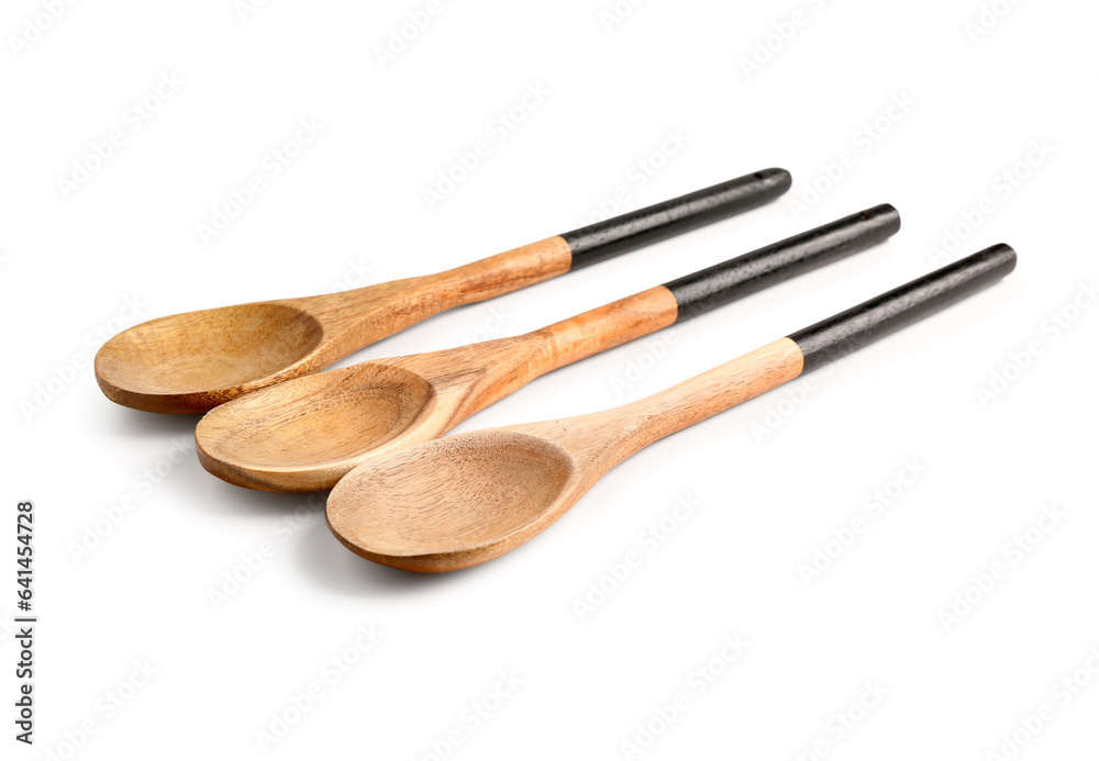 Set of wooden spoons isolated on white background