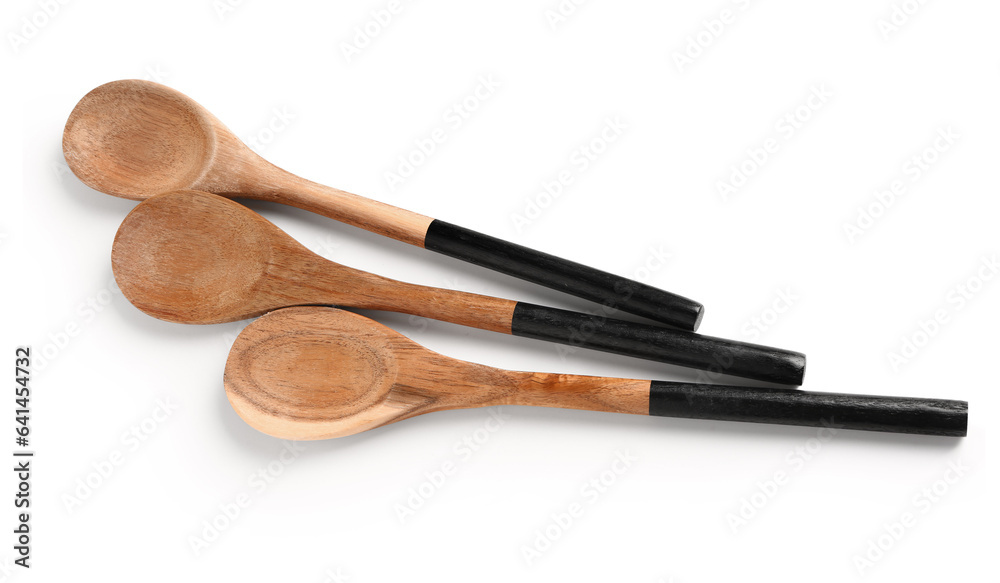 Set of wooden spoons isolated on white background