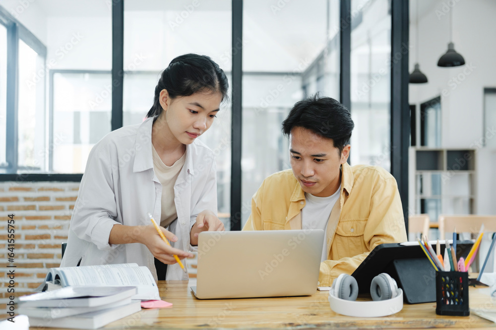 Young students campus helps friend catching up and learning.