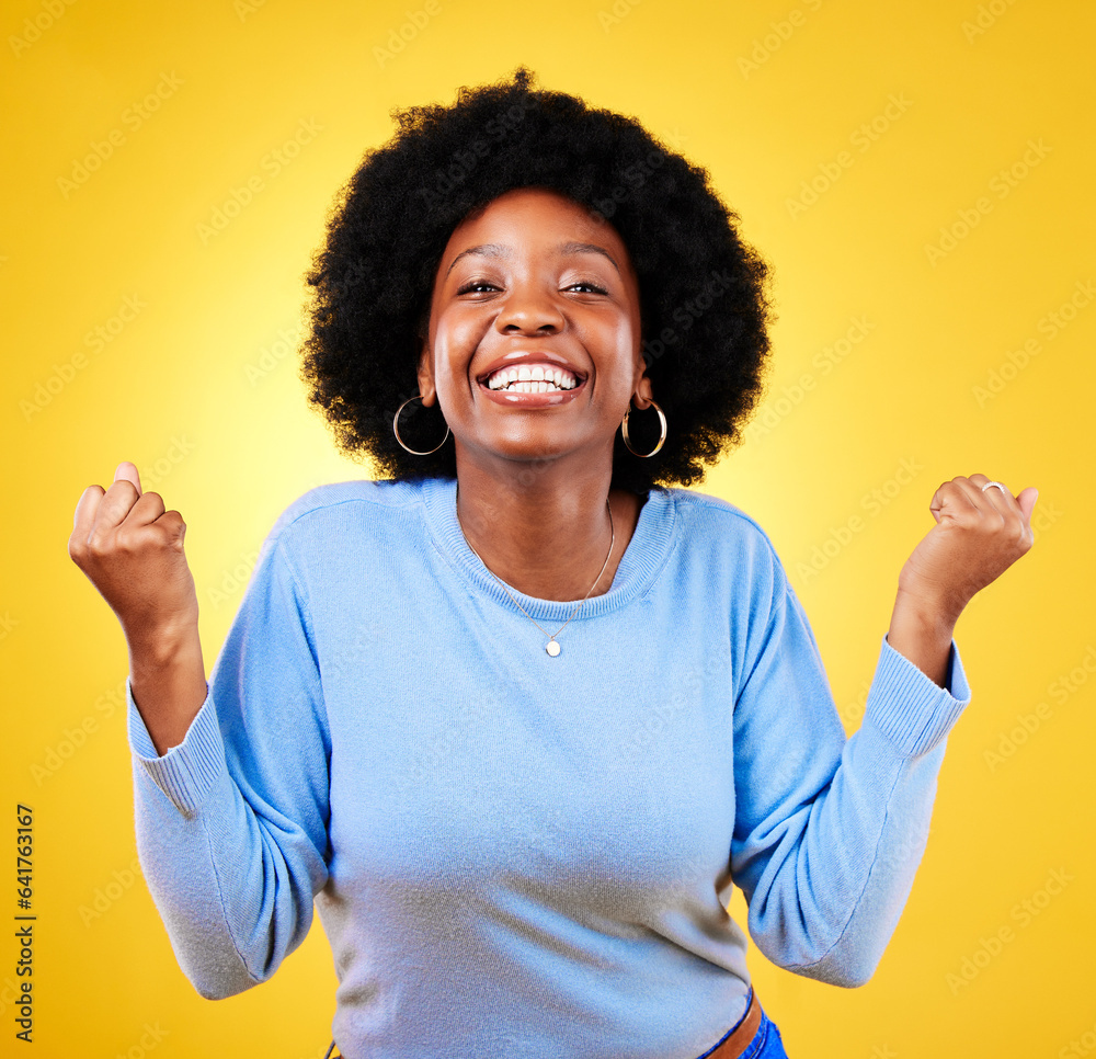 Woman, portrait and fist in studio of success, celebrate promotion or winning lottery bonus on yello