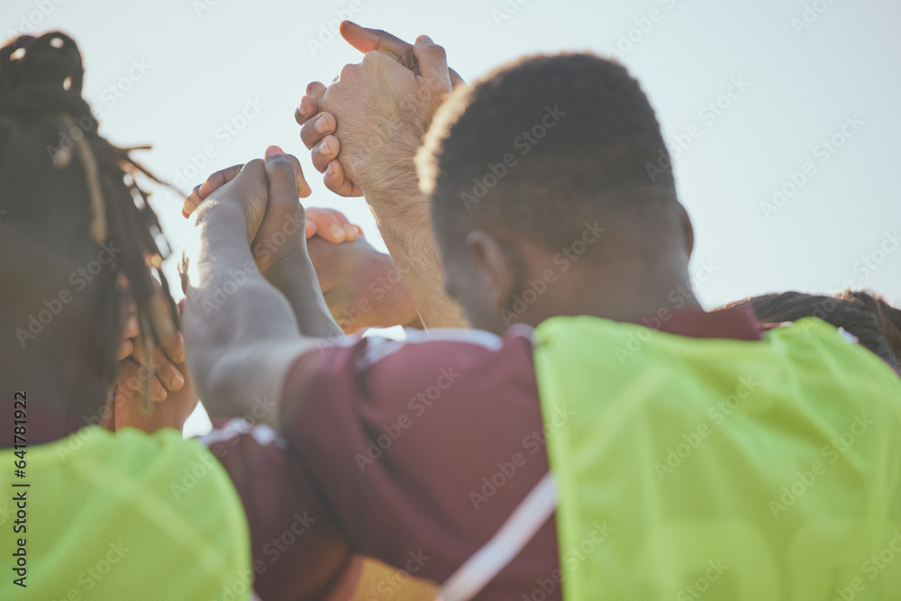 Football, teamwork and men holding hands, fitness and cooperation with collaboration, training and e