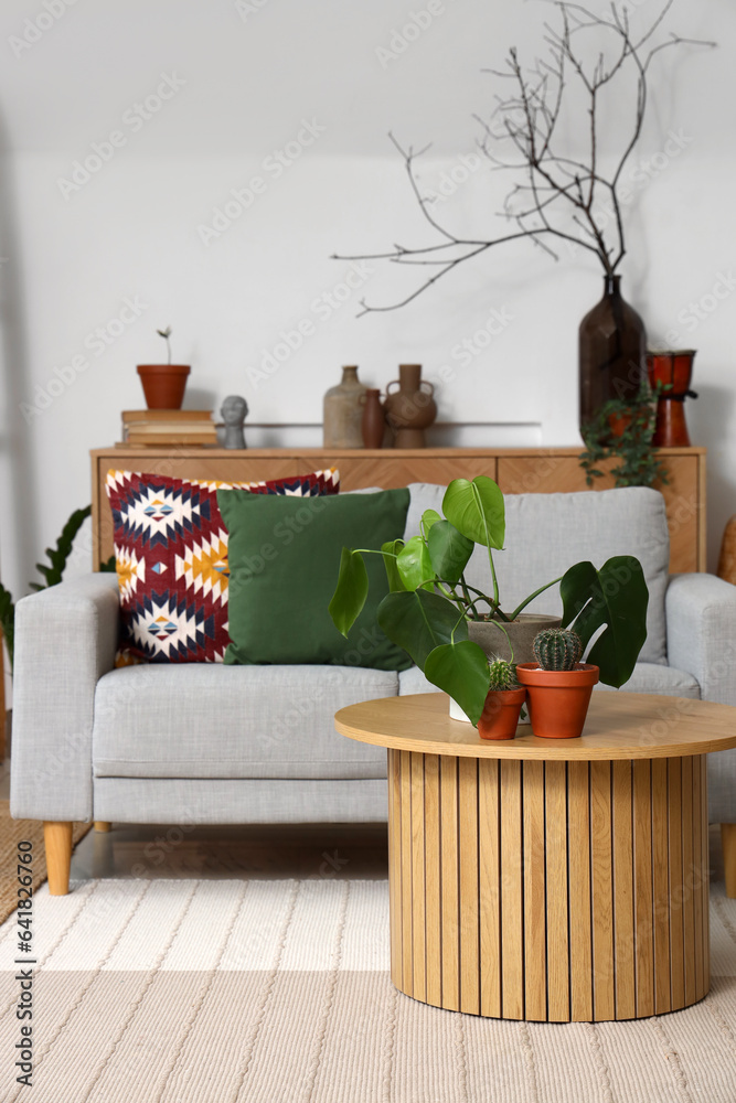 Interior of living room with coffee table and sofa