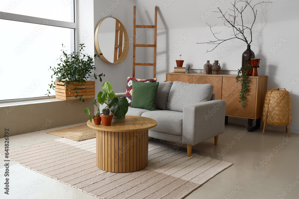 Interior of living room with coffee table and sofa