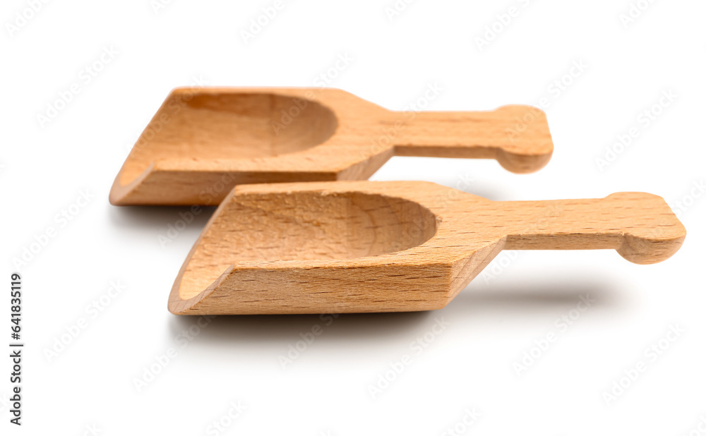 Set of wooden scoops isolated on white background