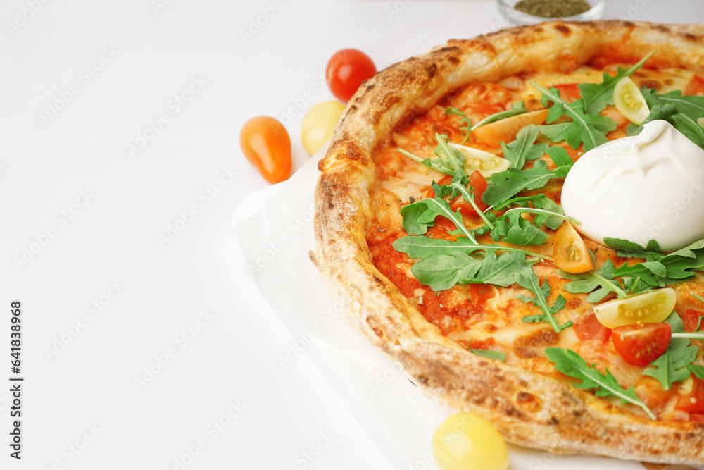 Tasty pizza with Burrata cheese on white background